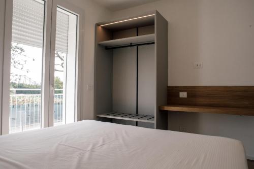 Postel nebo postele na pokoji v ubytování K Modern Apartments