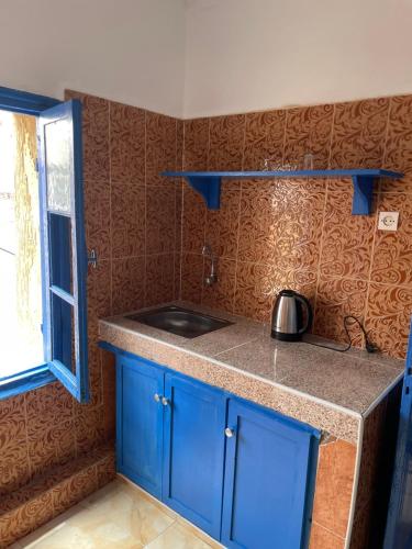 Kuchyň nebo kuchyňský kout v ubytování BLUE RIAD