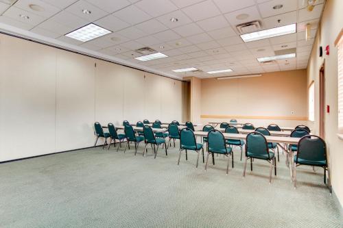a conference room with a row of chairs in it at Hotel Bemidji in Bemidji