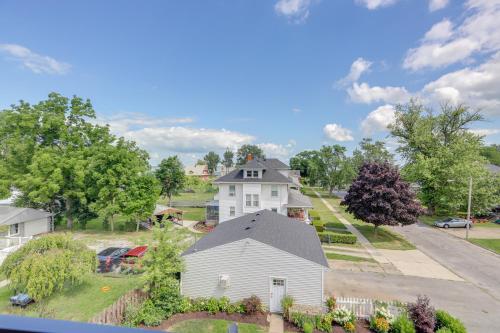an aerial view of a white house on a street at Port Clinton Home with Lake View - Walk to Beach! in Port Clinton