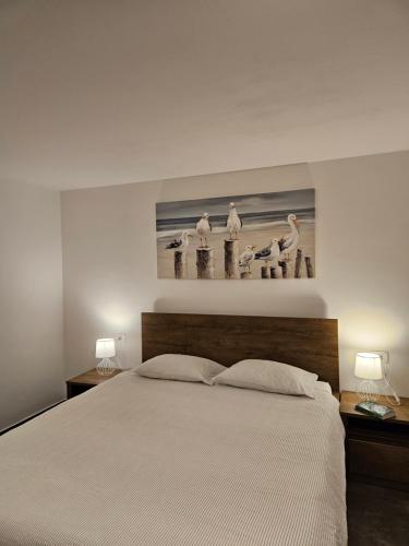 Posteľ alebo postele v izbe v ubytovaní Apartments Brajde