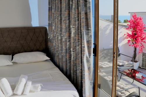 Cama o camas de una habitación en Sea View Apartments