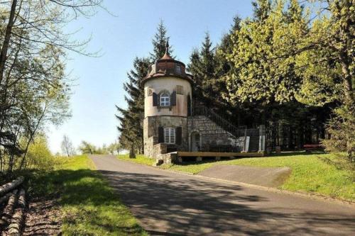 an old building on the side of a road at Ferienhaus in Bärnau mit Großem Garten in Bärnau