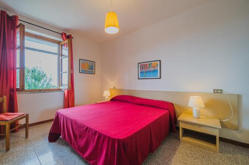 Katil atau katil-katil dalam bilik di Appartamenti Casa Sant'Andrea - Goelba