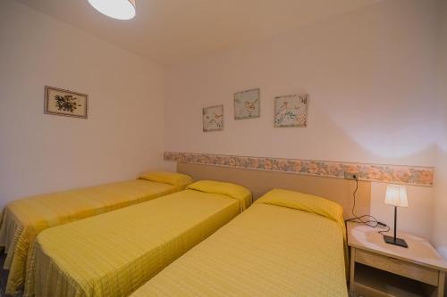 Katil atau katil-katil dalam bilik di Appartamenti Casa Sant'Andrea - Goelba