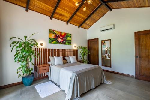 Ένα ή περισσότερα κρεβάτια σε δωμάτιο στο Villas Jawara ! Un Volcán en su Jardín !