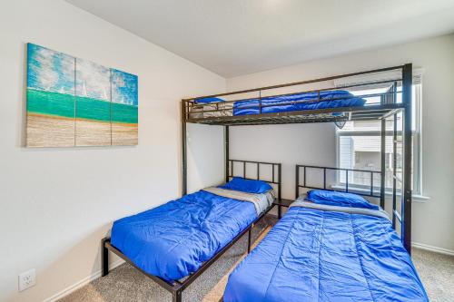 two bunk beds in a room with a window at San Antonio Home with Pool Access 11 Mi to SeaWorld in San Antonio