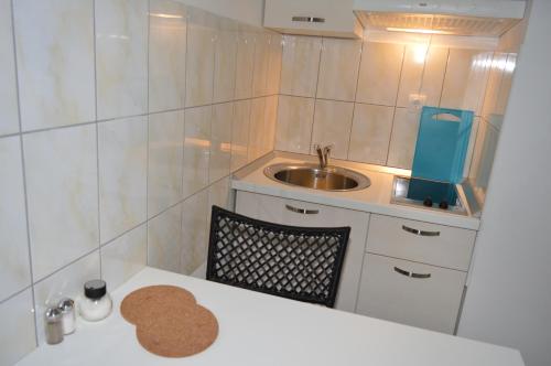 Koupelna v ubytování Permarinus Apartments