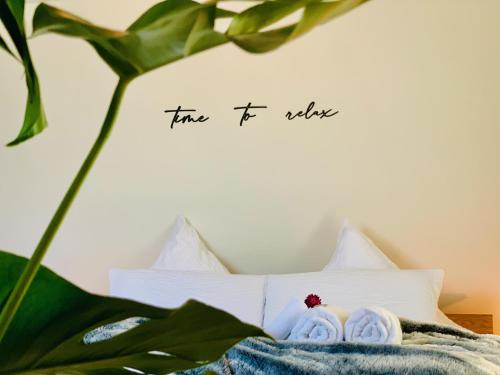 a sign on a wall that reads true foto at Dora o wellness o mountainview o lake Lucerne in Ingenbohl