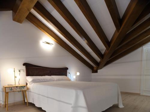 Ένα ή περισσότερα κρεβάτια σε δωμάτιο στο V11apartamentos 4