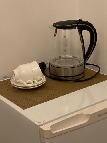 Tetera y cafetera en Hotel Varios