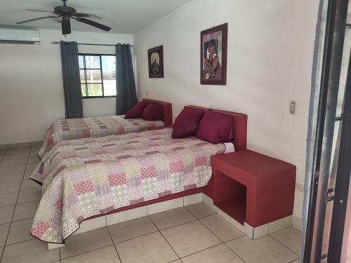 Una cama o camas en una habitación de La Table de Apoyo
