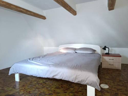 Postel nebo postele na pokoji v ubytování Mäo Apartment