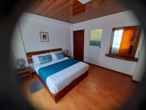 Postel nebo postele na pokoji v ubytování Casa Verde Descanso 2
