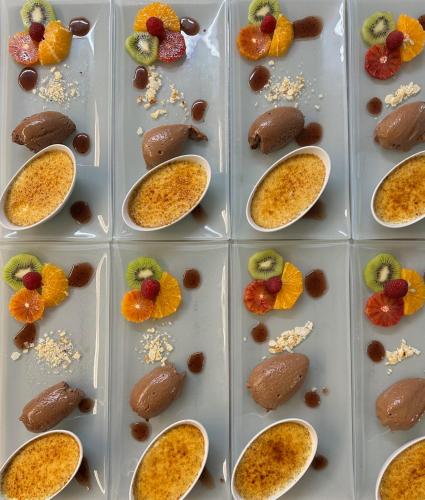 a muffin pan filled with different types of fruit at Schwarzwaldhotel Oberwiesenhof in Seewald