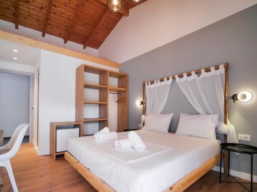 Postel nebo postele na pokoji v ubytování Orchard Retreat