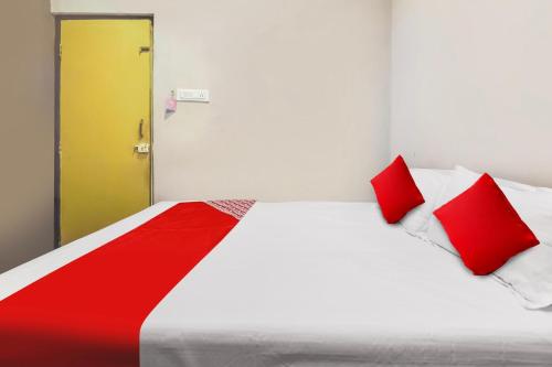 Postel nebo postele na pokoji v ubytování Hotel O Delight Inn