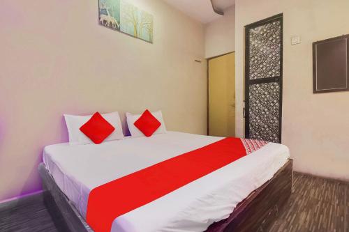 Postel nebo postele na pokoji v ubytování Hotel O Delight Inn