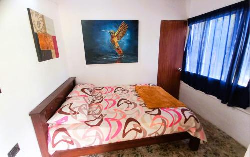 Una cama o camas en una habitación de Casa Finca Minas