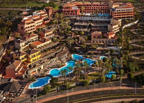 an aerial view of a resort with swimming pools at Melia Jardines del Teide - Adults Only in Adeje