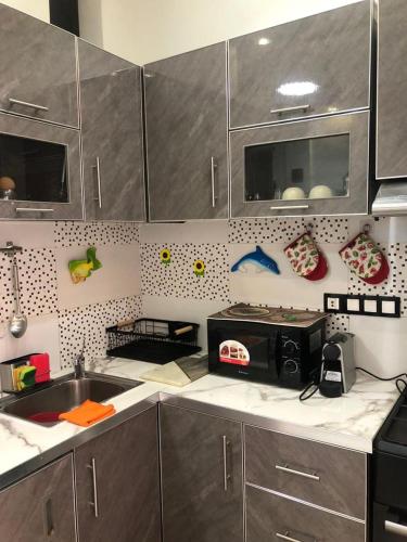 Dapur atau dapur kecil di Seckebe immo et Business STUDIO DAKAR Suite 4