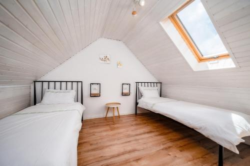 Postel nebo postele na pokoji v ubytování Cabana Maia