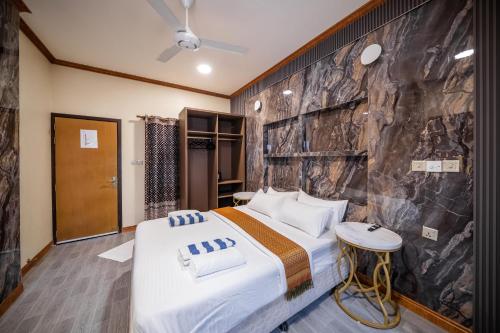 Cama o camas de una habitación en Bibee Maldives
