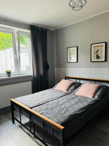 Postel nebo postele na pokoji v ubytování Apartamenty ToTuGdynia 7