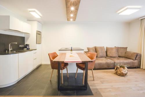 Cuisine ou kitchenette dans l'établissement Haus Andorra mit Matterhornblick
