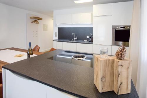 Cuisine ou kitchenette dans l'établissement Haus Andorra mit Matterhornblick