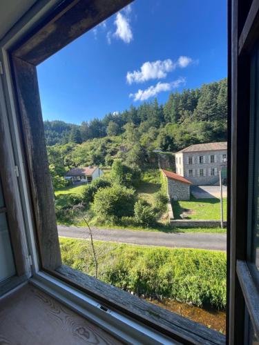 a view from a window of a building at Chez la ptite famille in Saint-Didier-sur-Doulon