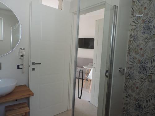 a bathroom with a shower and a sink at Luna D'Argento in Leporano Marina