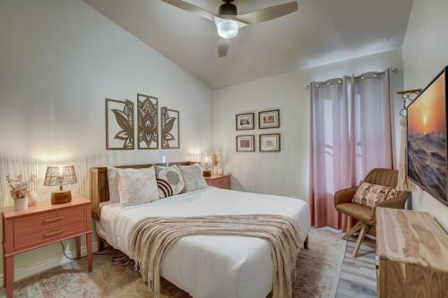 a bedroom with a large bed and a chair at Kiva Cove Pool & Sun Loungers on the Patio in Mesa