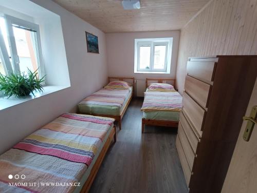 Postel nebo postele na pokoji v ubytování Penzion Dajan