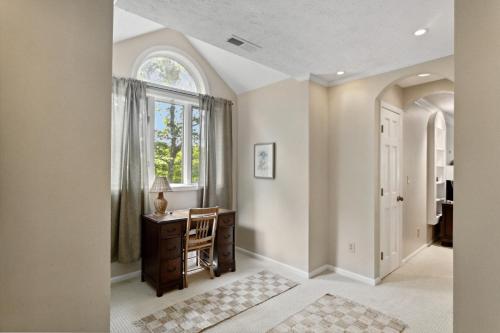 a home office with a desk and a window at Ridgeline Views in Boone