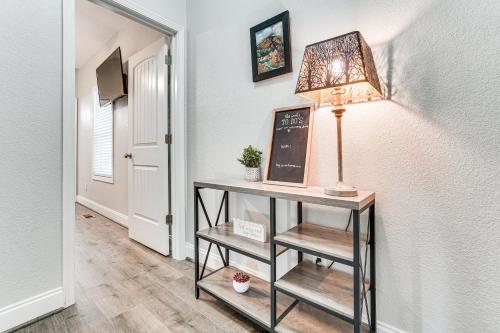 a room with a table with a lamp on it at Charming Helen Vacation Rental 2 Mi to Village! in Helen
