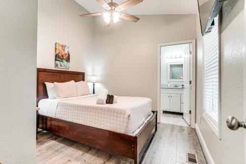 a bedroom with a bed and a ceiling fan at Charming Helen Vacation Rental 2 Mi to Village! in Helen