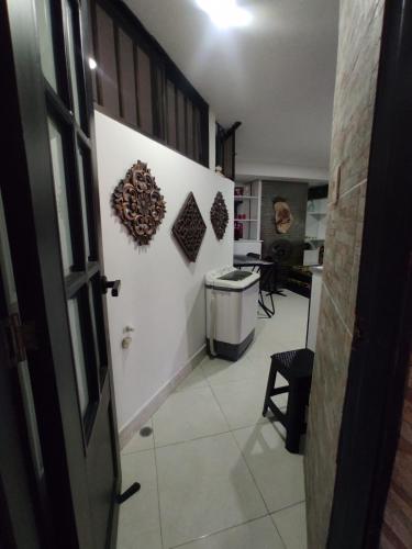 a hallway of a room with a door and a room with at Apartamentos en el rodadero in Rodadero
