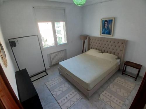 Кровать или кровати в номере Stayinn apartment lac 2