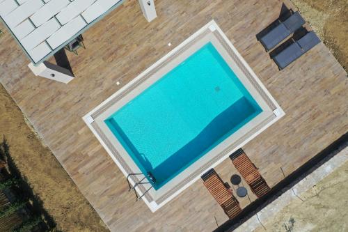 Πισίνα στο ή κοντά στο Liotopos Villas