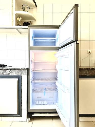 Kuchyň nebo kuchyňský kout v ubytování Appartement en résidence privée