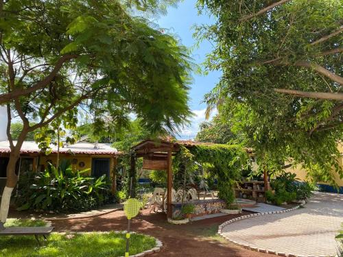 a garden in front of a house at Hotel Vida Bella in Chapala