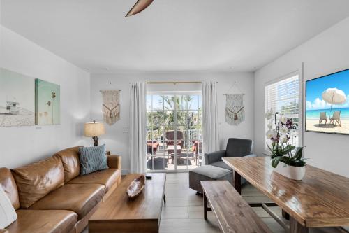 a living room with a couch and a table at Lime Tree Bay Resort in Islamorada