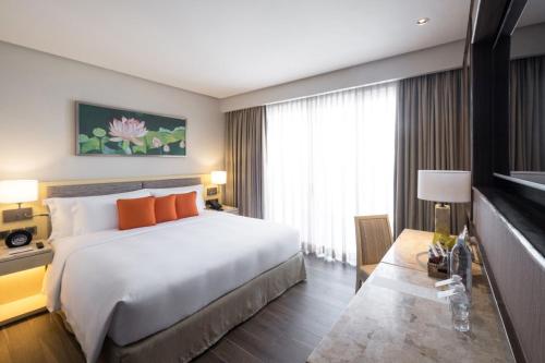 Cama o camas de una habitación en Dusit Thani Mactan Cebu Resort