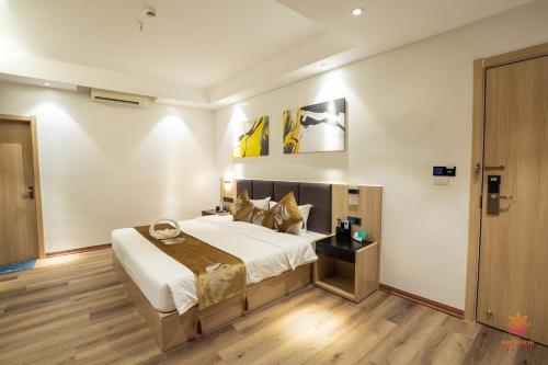 Postel nebo postele na pokoji v ubytování Hotel Miamor