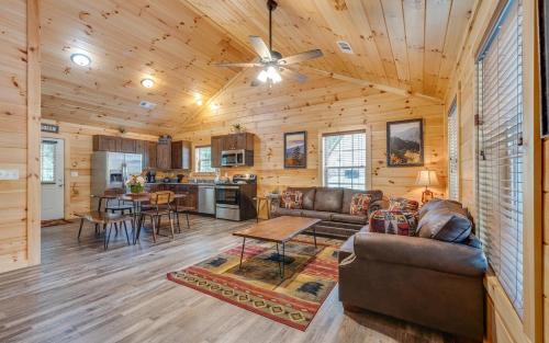 a living room with a couch and a table at Bear Clubhouse in Pigeon Forge