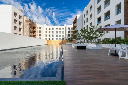 Πισίνα στο ή κοντά στο Luxury Apartment with Pool and Jacuzzi on Terrace in Médano