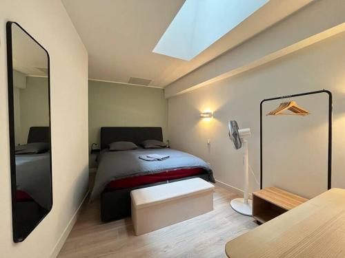 Postel nebo postele na pokoji v ubytování Pénitents Gris - 100m du Capitole - Beau T3 - parking