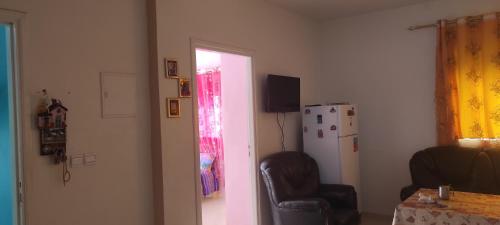 Телевизор и/или развлекательный центр в Appartements de Vacances Près de la Plage Perle Bleue Saidia