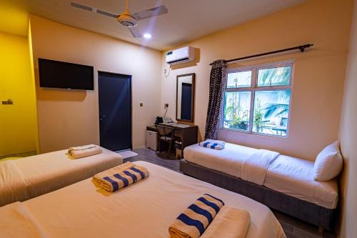 Cama o camas de una habitación en Bibee Maldives